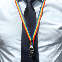 Load image into Gallery viewer, Person wearing a lanyard in the colours of the intersex inclusive progress flag over a shirt and tie.