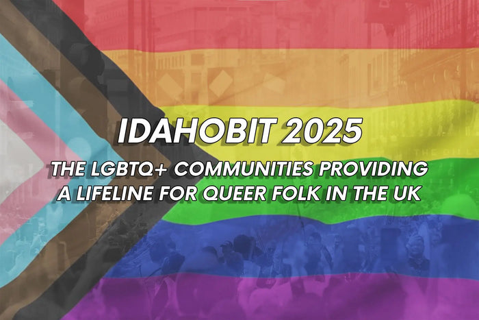  Header graphic for a blog titled “IDAHOBIT 2025: The LGBTQ+ Communities Providing a Lifeline for Queer Folk in the UK.” The background features a faded crowd at a Pride parade with the Progress Pride flag overlaid, including trans, black and brown stripe