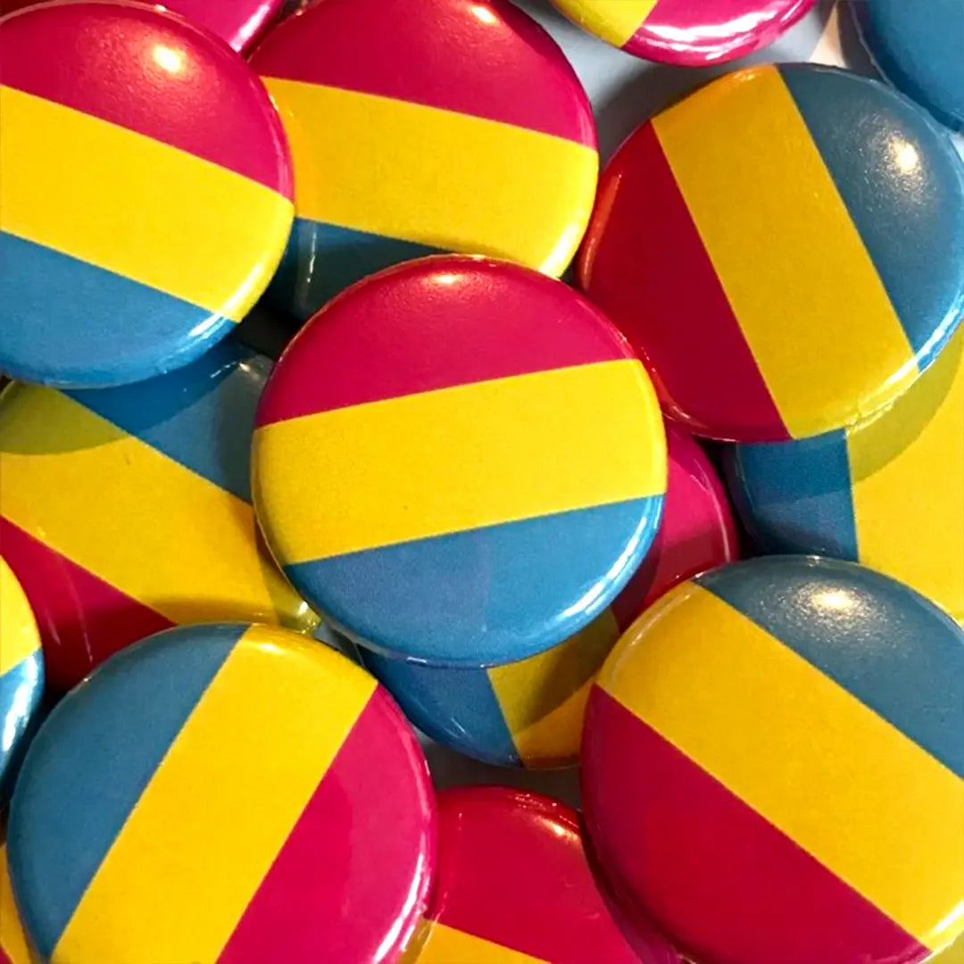 A pile of pansexual flag badges