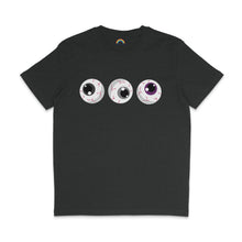 Load image into Gallery viewer, A dark heather grey t-shirt featuring three eyeballs with black, grey, and purple irises, representing the Asexual pride flag colours. The eyeballs are cartoonish with red veins, arranged horizontally across the chest.