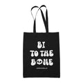 Black cotton tote bag featuring the slogan Bi To The Bone in white text