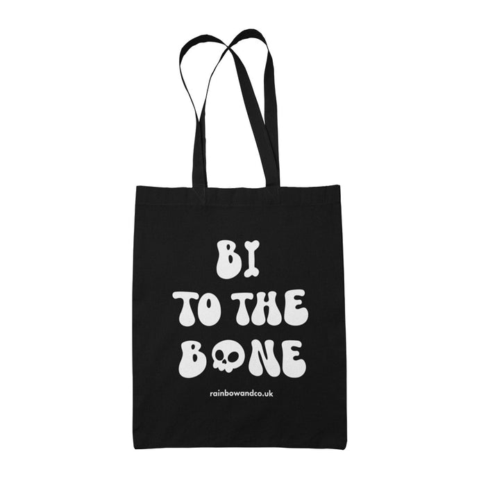 Black cotton tote bag featuring the slogan Bi To The Bone in white text