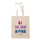 Natural cotton tote bag featuring the slogan Bi To The Bone in the colours of the bisexual flag