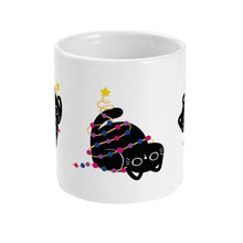 Load image into Gallery viewer, A white ceramic mug featuring a black cat wrapped in festive bisexual-themed Christmas lights, laying playfully on its back. The lights are coloured in pink, blue, and purple, representing the bisexual pride flag.