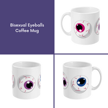 Load image into Gallery viewer, A composite image of a white coffee mug with a cartoon eyeball design in bisexual pride flag colours.