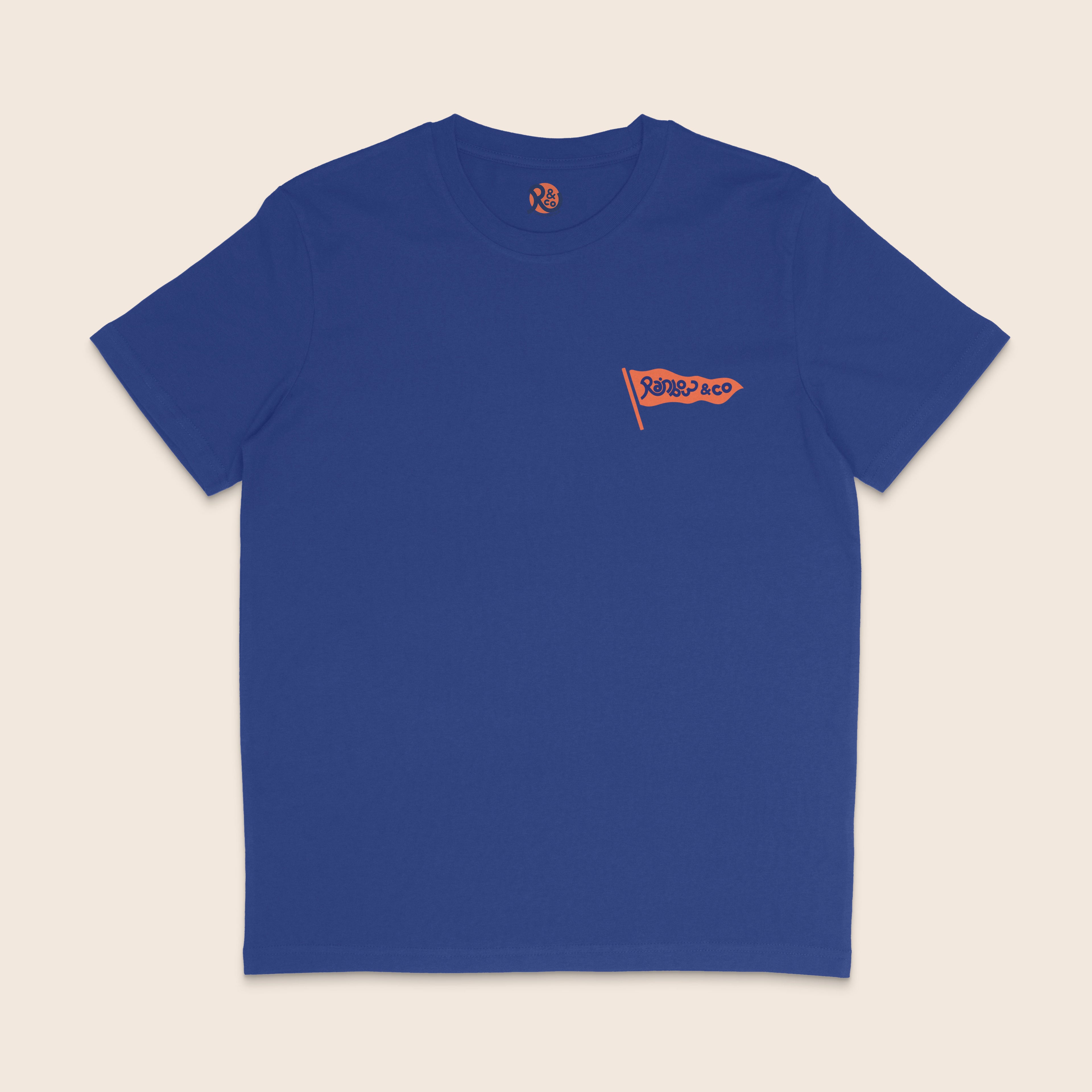 Front of a royal blue organic cotton t-shirt featuring a small orange Rainbow & Co flag logo printed on the left chest.