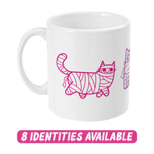 Load image into Gallery viewer, A white ceramic mug featuring a whimsical design of cartoon cats wrapped in mummy bandages, depicted in shades of pink and purple. The artwork highlights three cats in different playful poses, each showcasing their unique personality. Below the mug, a bold pink text reads &quot;8 IDENTITIES AVAILABLE&quot; in a dripping font, indicating the availability of this design in various identity options.