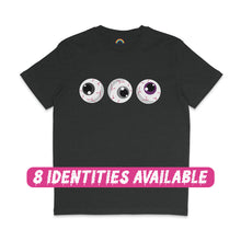 Load image into Gallery viewer, A dark heather grey t-shirt featuring a spooky design of three cartoon eyeballs with detailed red veins. The eyeballs are aligned horizontally across the chest, with the irises coloured in black, grey, white, and purple, representing the Asexual pride flag. Below the design, a pink banner with white, dripping text reads, &quot;8 IDENTITIES AVAILABLE,&quot; indicating the shirt is available in multiple pride flag colour variations.