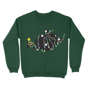 A dark green sweatshirt with a black cat playfully wrapped in string lights showcasing gay pride colours, topped with a star on the tail.