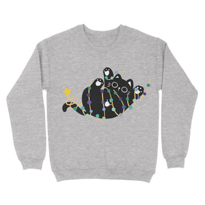 A heather grey sweatshirt adorned with a black cat tangled in green and blue gay pride lights, its tail ending in a star.