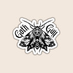 Goth Gay sticker featuring a black and white gothic moth illustration with blackletter text