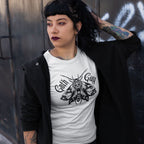 Model wearing a white Goth Gay shirt featuring a detailed black gothic moth illustration and blackletter text