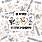 Be Afraid We Have Pronouns goose sticker in the foreground with a blurred repeating pattern of the Halloween goose design behind it.