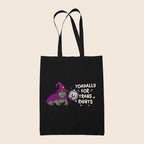 Black cotton tote bag featuring a wizard toad in purple with the words Toadally For Trans Rights
