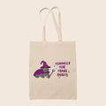 Natural cotton tote bag featuring a wizard toad in purple with the words Toadally For Trans Rights