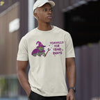 Model wearing a vintage white Toadally for Trans Rights T-shirt featuring a green wizard toad with a purple hat, cape and wand.