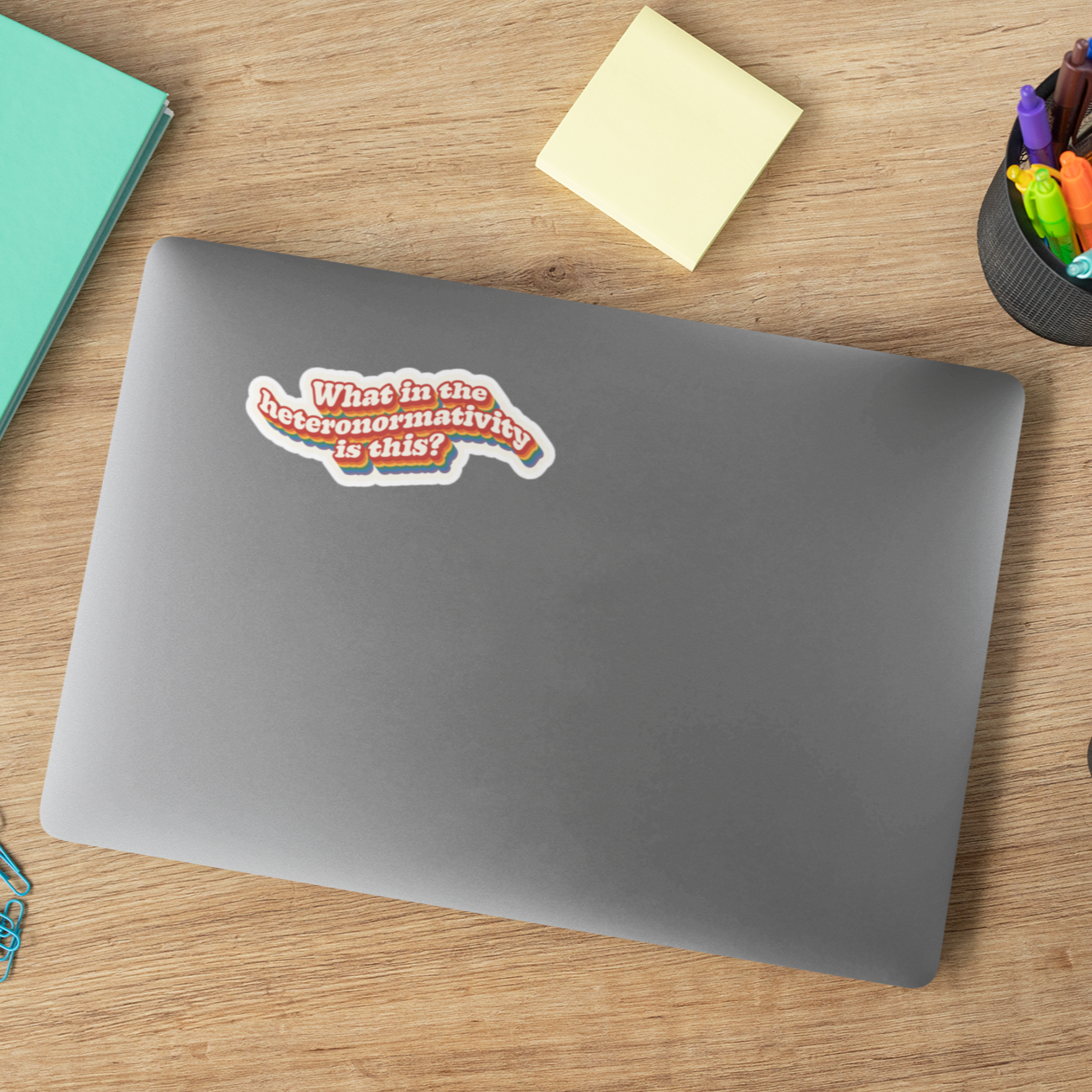 What in the Heteronormativity is this? Vinyl sticker on a laptop lid