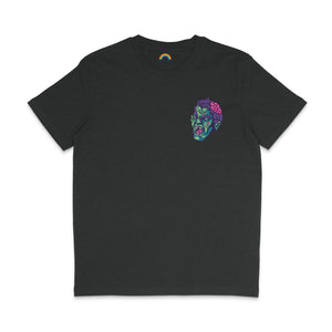 A Dark Heather Grey T-shirt displaying a small graphic on the left chest area. The design shows a green zombie head with purple hair and part of the pink brain exposed, mirroring the style of the larger graphic on the back. This design gives the shirt a cohesive look with a striking yet minimal front detail.