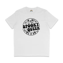 Load image into Gallery viewer, A white T-shirt with the phrase &quot;In My Spooky Queer Era&quot; printed in bold, dripping black letters, surrounded by bat and skull illustrations, giving a Halloween-themed look. The shirt is laid flat on a white background.