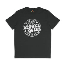 Load image into Gallery viewer, A dark heather grey T-shirt featuring the same &quot;In My Spooky Queer Era&quot; design in white, with dripping letters and Halloween-themed illustrations. The shirt is laid flat on a matching dark background.