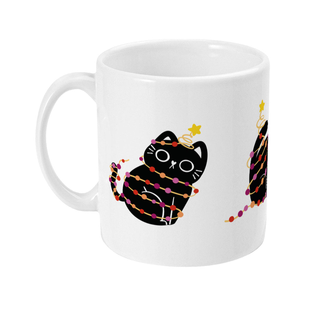 Left view showing the black cat wrapped in lesbian pride coloured festive lights."