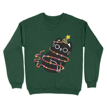 Load image into Gallery viewer, A warm, bottle green sweatshirt with a black cat tangled in Christmas lights reflecting the lesbian pride flag colours. The cat sits upright, looking adorable, with a festive gold star at the top of its tail.