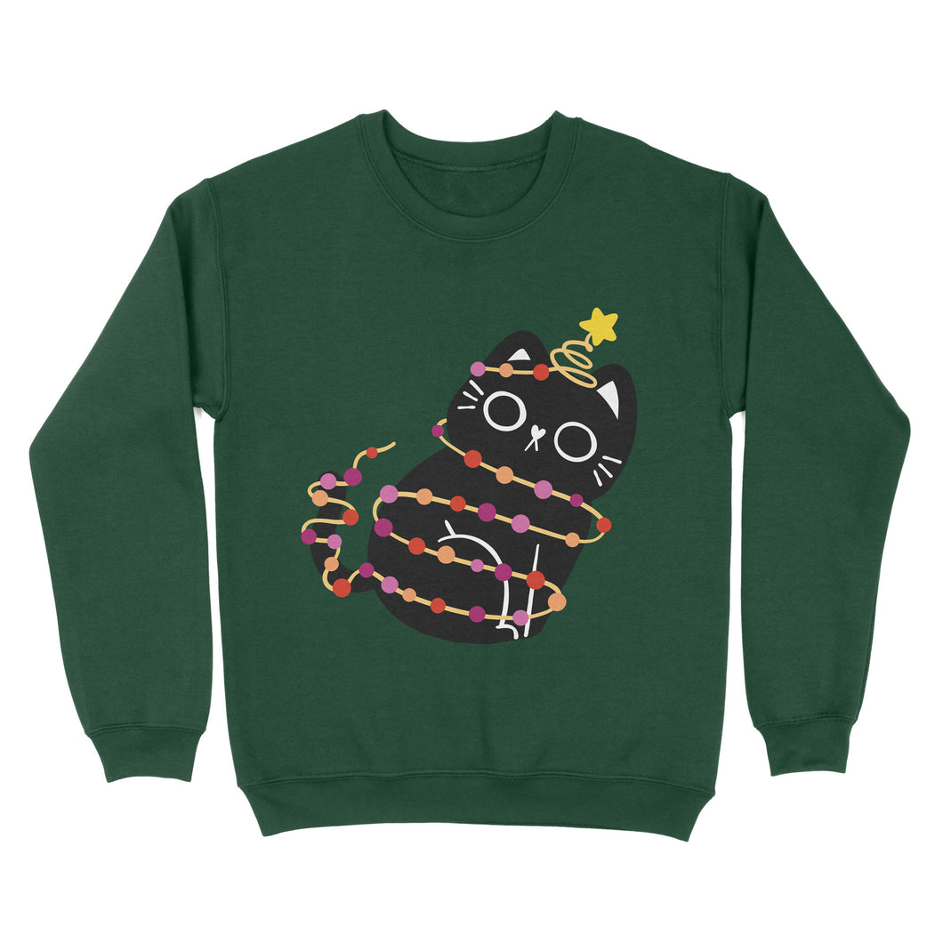 A warm, bottle green sweatshirt with a black cat tangled in Christmas lights reflecting the lesbian pride flag colours. The cat sits upright, looking adorable, with a festive gold star at the top of its tail.