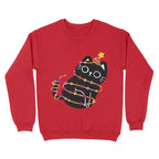A bright, fire red sweatshirt adorned with a black cat playfully tangled in Christmas lights styled with the lesbian pride flag colours. A gold star sits atop the cat's tail, perfect for adding festive pride cheer.