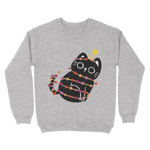 Load image into Gallery viewer, A cosy sweatshirt in heather grey featuring a playful black cat wrapped in festive Christmas lights designed in the colours of the lesbian pride flag, complete with a gold star atop its head. Perfect for subtle festive pride.