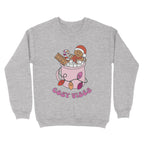 Heather Grey sweatshirt featuring retro text reading 'cosy vibes'. The image shows a mug of hot chocolate with marshmallows and a gingerbread man wearing a Santa hat. A candy cane in the mug and lights around the mug are the colours of the lesbian pride flag.