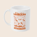 White ceramic mug featuring a retro orange design of a cheerful cartoon sun holding a striped flag. The text reads: “A day without lesbians is like a day without sunshine,” with a checkerboard background.