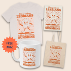 Vintage White T-shirt, natural-coloured tote bag, art print and white mug arranged on a cream background, each featuring a smiling sun waving a flag and “A day without lesbians is like a day without sunshine” text. An orange starburst beside the mug reads “FREE MUG!”