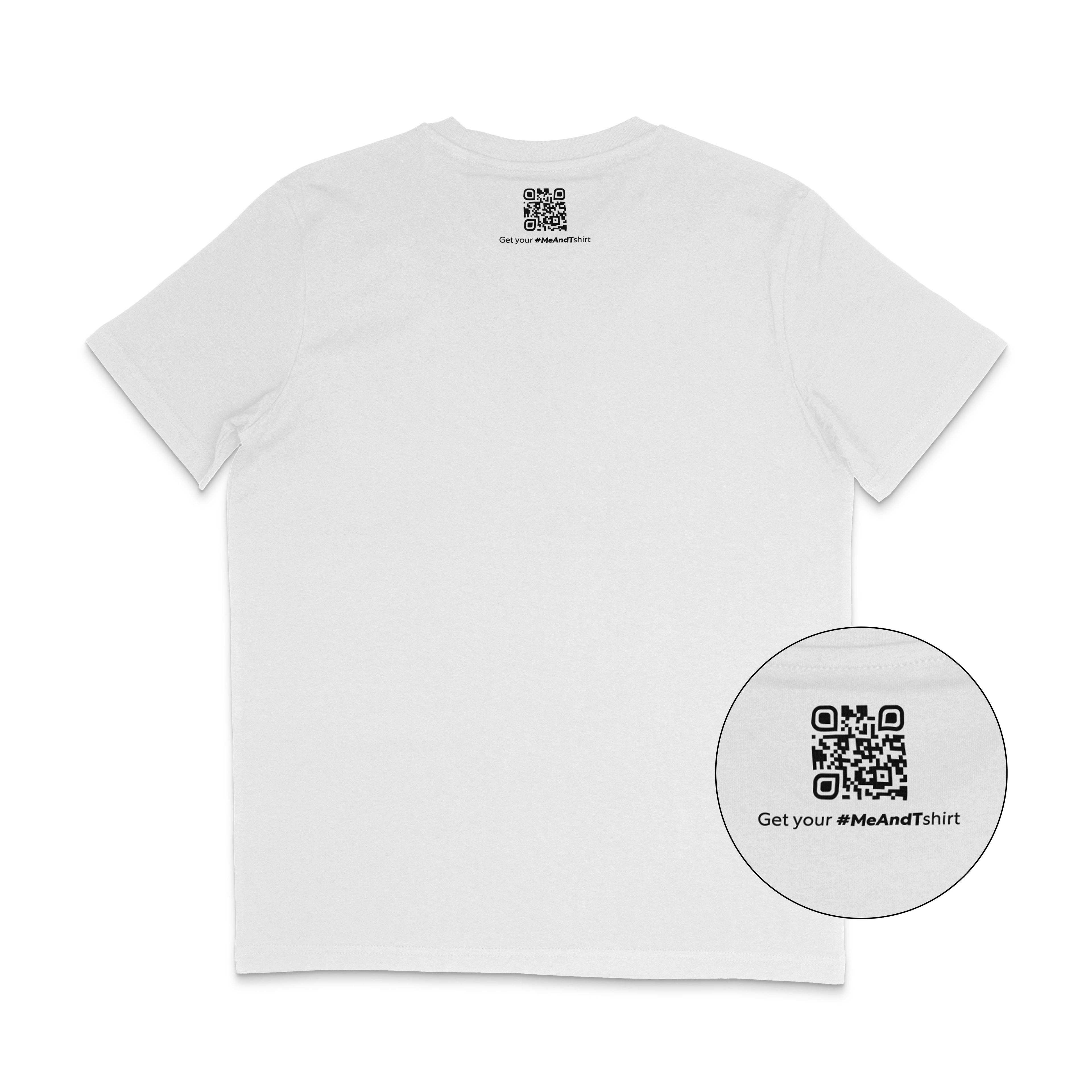 Back of a white t-shirt featuring a small black QR code printed just below the neckline, with the text “Get your #MeAndTshirt” underneath. A circular zoom-in highlights the QR detail.