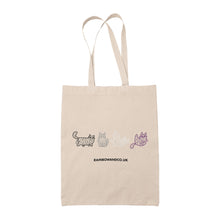 Load image into Gallery viewer, A natural canvas tote bag featuring a line drawing of four mummy cats in varying shades of grey and purple, symbolising the Asexual pride flag. The design includes cute mummy-wrapped cats in different poses.
