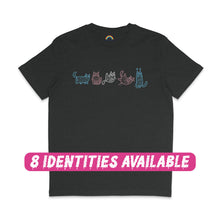 Load image into Gallery viewer, A black T-shirt featuring five mummy cat illustrations in the colours of the transgender flag. The cats are drawn in light blue, pink, and white, each wrapped in bandages and posed uniquely across the chest of the shirt. A pink text overlay at the bottom reads &quot;8 IDENTITIES AVAILABLE,&quot; highlighting the diverse options for this design.