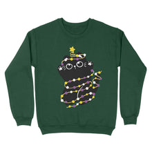 Load image into Gallery viewer,  A bottle green sweatshirt showcasing a black cat tangled in non-binary flag-coloured string lights—yellow, white, purple, and black. The cat is adorned with a small star on its tail for a festive touch.