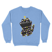 Load image into Gallery viewer, A cornflower blue sweatshirt with a playful black cat wrapped in string lights of the non-binary flag colours—yellow, white, purple, and black. A star sits atop its tail, adding to the Christmas spirit.