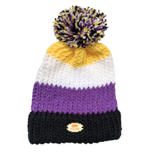 Load image into Gallery viewer, Striped knitted bobble hat in the colours of the Non Binary pride flag laying flat.