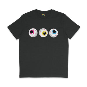 A dark heather grey t-shirt featuring three eyeballs with pink, yellow, and blue irises, symbolising the Pansexual pride flag colours. The eyeballs are illustrated with red veins and are evenly spaced across the front.