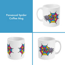 Load image into Gallery viewer, A composite image of a white coffee mug with a cartoon spider and spider web design in pansexual pride flag colours. 