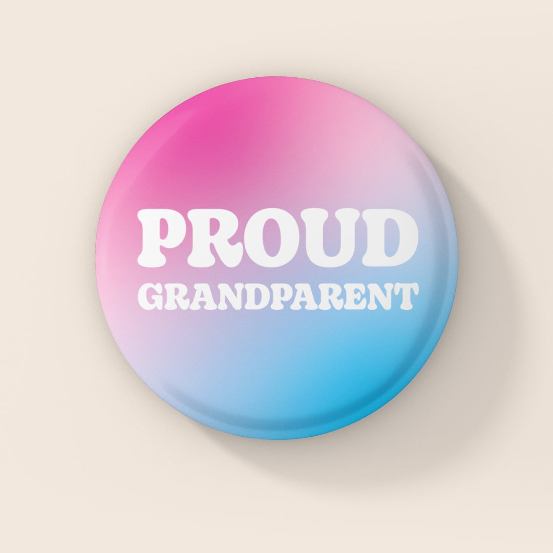 38mm Proud Grandparent badge in transgender flag colours with pink, white and blue gradient background and white text.