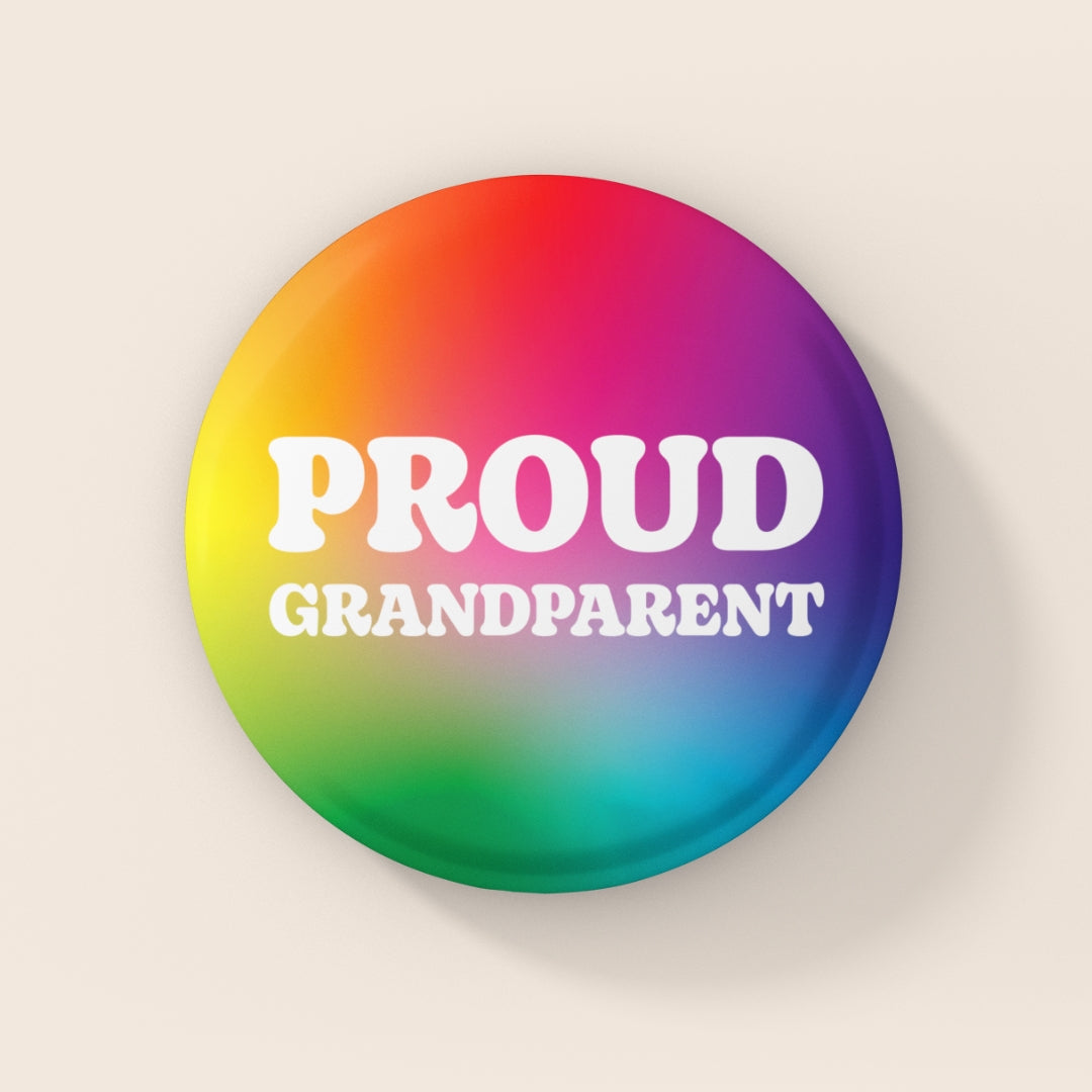Round 38mm rainbow gradient badge with white text reading “Proud Grandparent”.