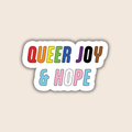Queer Joy & Hope vinyl sticker featuring bold, retro-style rainbow lettering above pink, white and blue lettering, with a white die-cut border against a pale beige background.