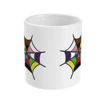 Load image into Gallery viewer, A front view of a white ceramic mug displaying two colourful rainbow spider webs on either side, without the spider. The webs are filled with pride flag colours, adding a vibrant, inclusive touch to the mug design.