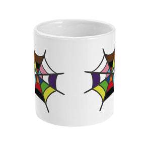 A front view of a white ceramic mug displaying two colourful rainbow spider webs on either side, without the spider. The webs are filled with pride flag colours, adding a vibrant, inclusive touch to the mug design.