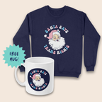 Navy sweatshirt and white mug featuring Santa’s face with “Santa Says Trans Rights” lettering in pink, blue and white, arranged on a cream background. A turquoise starburst beside the mug reads “FREE MUG!”