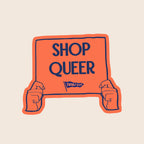 Shop Queer vinyl sticker featuring illustrated hands holding an orange protest sign with the words "Shop Queer".