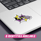 A colourful sticker featuring a cartoon spider with red eyes, resting on a spider web with a pattern that combines black, yellow, white, and purple colours, representing the non binary flag. The sticker is placed on the corner of a silver laptop, showcasing its vibrant design against the sleek surface. At the bottom, there is text in a playful pink font that reads "8 Identities Available."