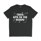 A dark heather grey T-shirt displaying a Halloween-themed design with the text "TERFs Give Me The Creeps" in bold, white dripping letters. The design is complemented by cartoon ghosts, bats, and speech bubbles that say "Boo", enhancing the spooky aesthetic of the shirt.