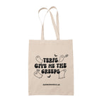 A natural cotton tote bag featuring the text "TERFs Give Me the Creeps" in a bold, spooky font with ghost illustrations around it. A bat graphic is included in the design, and the website "RAINBOWANDCO.UK" is printed at the bottom.